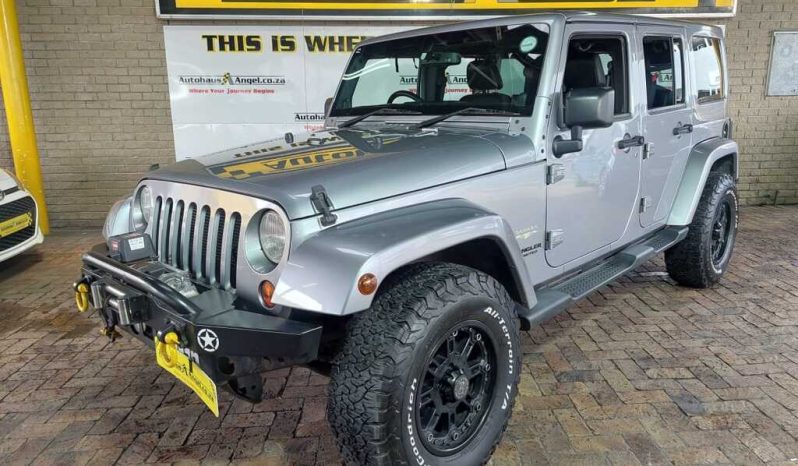 https://autohausangel.co.za/usedcar/2013-jeep-wrangler-unltd-sahara-3-6l-v6-a-t/